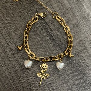Gold plated stainless steel charm bracelet